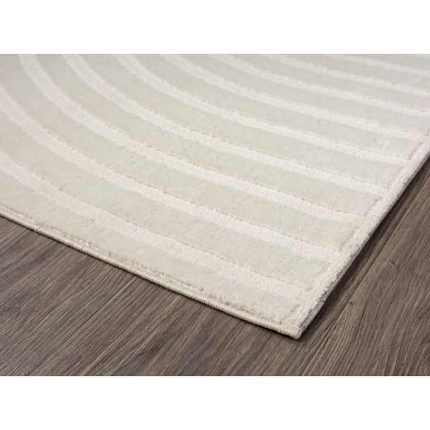 Denne produkten heter Bella Zen, laget av Polyester & Polypropylen materiale med en vakker Offwhite farge – SE Mattor