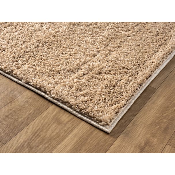 Denne produkten heter Softy, laget av Polypropylen materiale med en vakker Mørk Beige farge – SE Mattor
